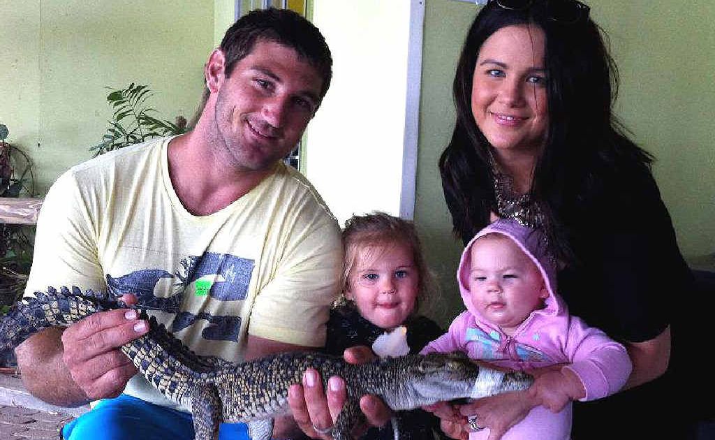 Recovering from minor surgery, rising football star Dave Taylor had one slippery, snappy surprise for wife Ashlee and daughters Macie and Aliah. Recovering from minor surgery, rising football star Dave Taylor had one slippery, snappy surprise for wife Ashlee and daughters Macie and Aliah.